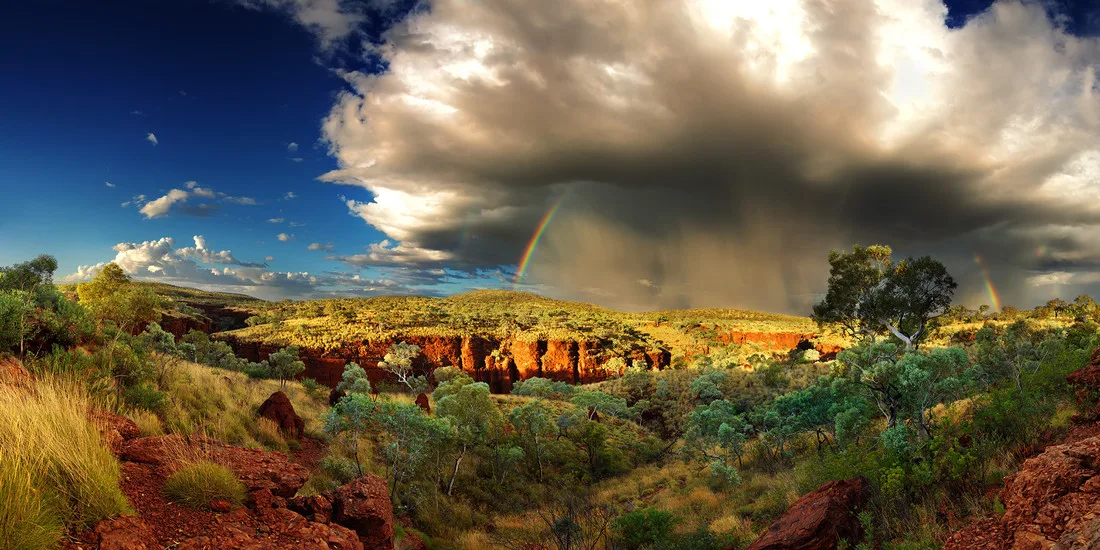 A huge storm brews over Karijini National Park in WA's Pilbara